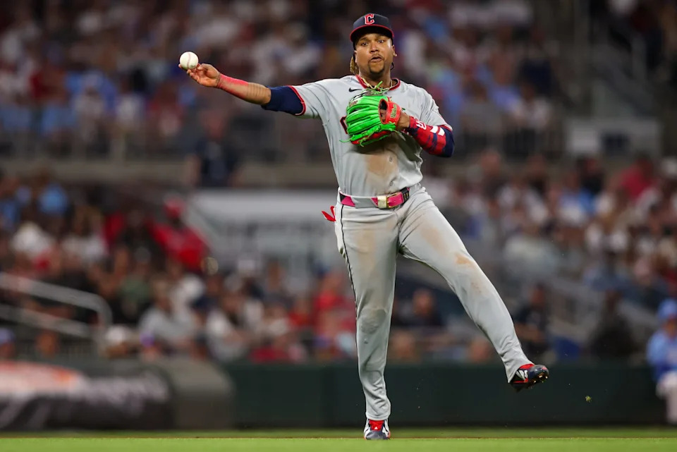 Cleveland Guardians third baseman Jose Ramirez (11) throws a runner out at first against the Atlanta Braves on April 10, 2026, in Atlanta, Georgia.