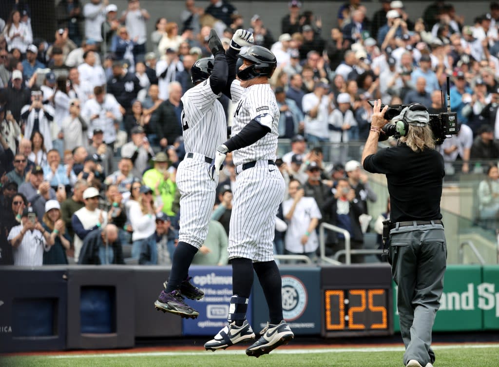 Yankees right fielder Aaron Judge (99) celebrated with first baseman Ben Rice (22) after he scores on his solo home run. Charles Wenzelberg/New York Post