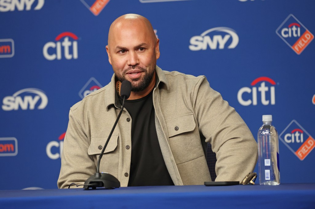 Carlos Beltran speaks at a press conference.