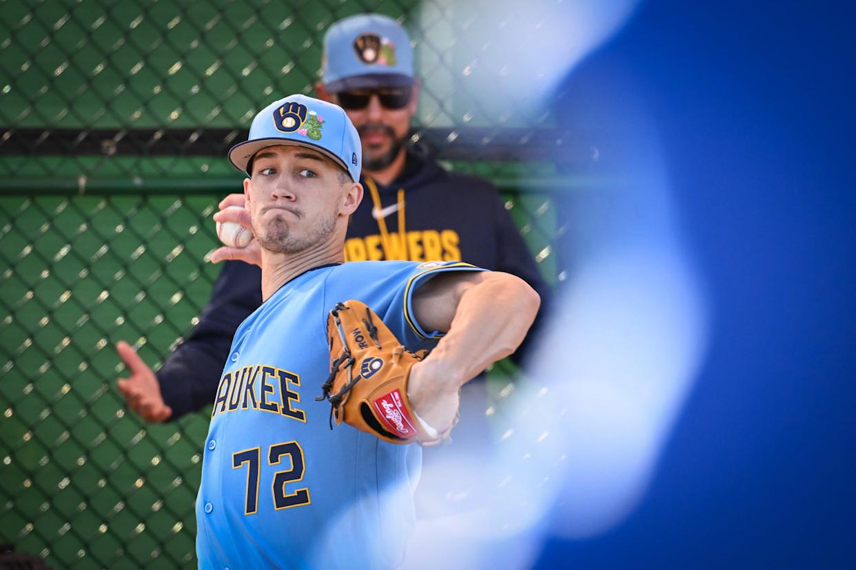 Milwaukee Brewers pitcher Coleman Crow (72) throws in the outfield during spring training workouts Saturday, February 14, 2026, at American Family Fields of Phoenix in Phoenix, Arizona.