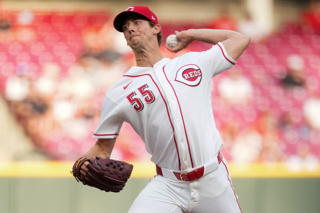 Cincinnati Reds pitcher Brandon Williamson delivers a pitch during a baseball game.