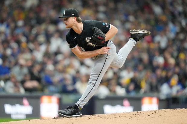 Chicago White Sox pitcher Shane Smith throws during the first inning of an opening-day baseball game against the Milwaukee Brewers, Thursday, March 26, 2026, in Milwaukee. (AP Photo/Kayla Wolf)