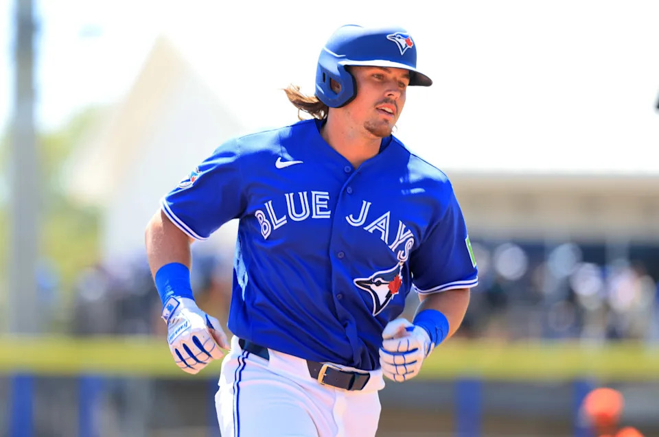 Toronto Blue Jays right fielder Addison Barger (47) hits a home run during the second inning against the Baltimore Orioles.Kim Klement Neitzel-Imagn Images