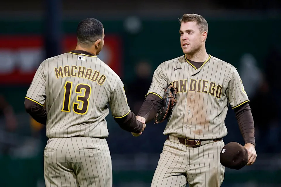Gavin Sheets #30 and Manny Machado #13 celebrate a team victory over the Pirates at PNC Park on April 6, 2025 in Pittsburgh.