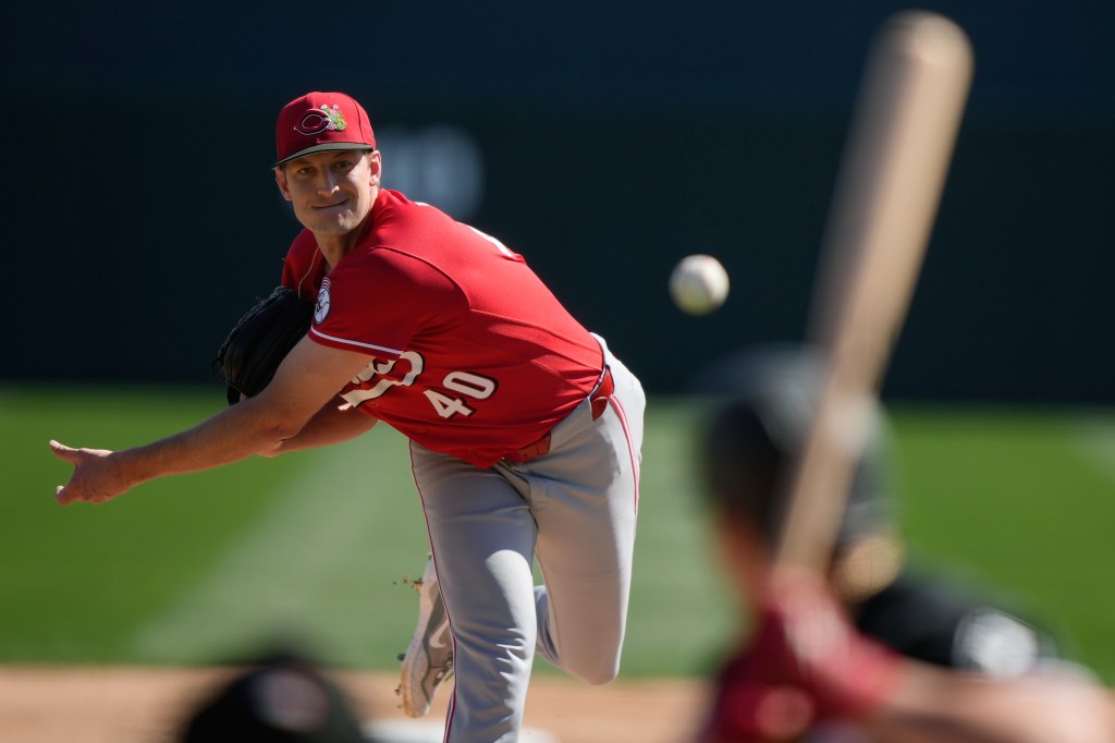 Cincinnati Reds pitcher Nick Lodolo delivers a pitch during a spring training game.