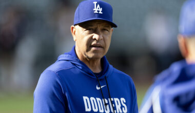Apr 21, 2026; San Francisco, California, USA; Los Angeles Dodgers manager Dave Roberts (30) chats with a coach before a game against the San Francisco Giants at Oracle Park. Mandatory Credit: D. Ross Cameron-Imagn Images