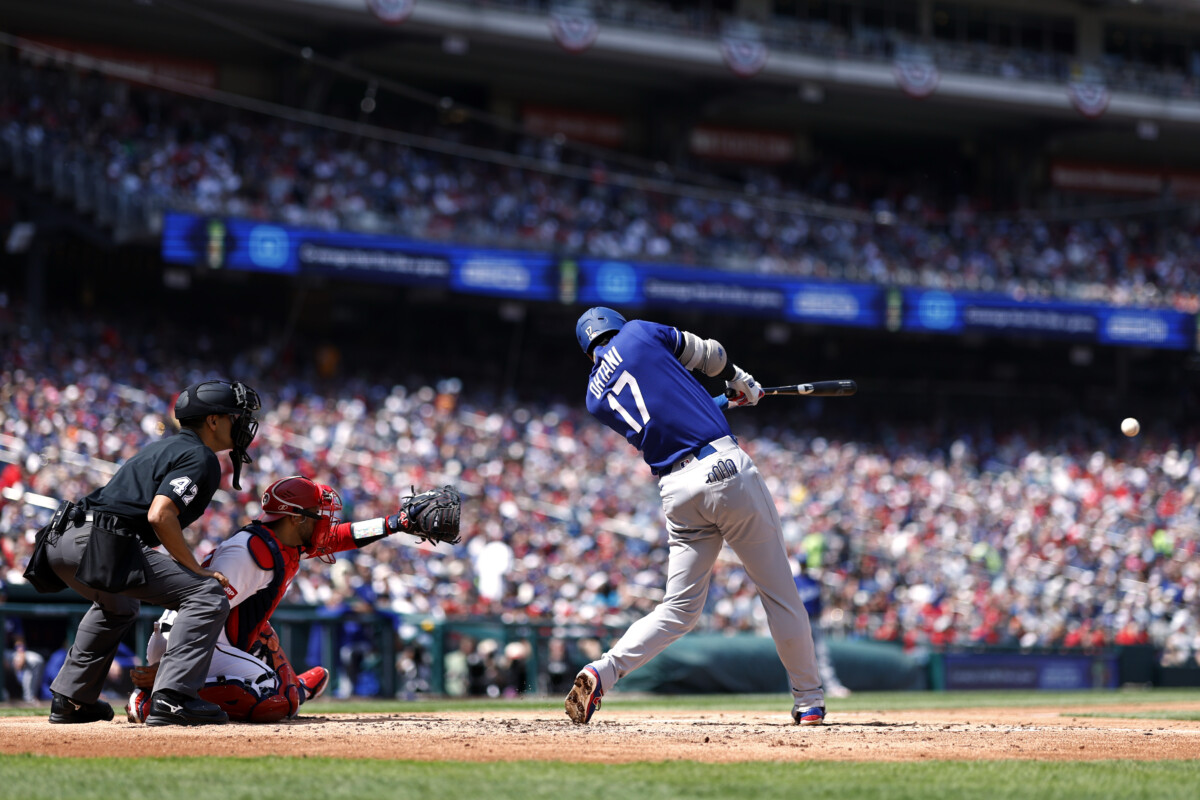 Apr 3, 2026; Washington, District of Columbia, USA; Los Angeles Dodgers two-way player Shohei Ohtani (17) singles against the Washington Nationals during the fourth inning at Nationals Park. Mandatory Credit: Geoff Burke-Imagn Images