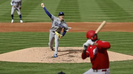 Los Angeles Dodgers starting pitcher Roki Sasaki (11) pitches against Washington Nationals left fielder James Wood (29) during the third inning at Nationals Park. 