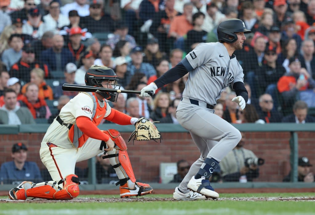 Yankees third baseman Ryan McMahon (19) hits a two-run RBI single during the second inning. Charles Wenzelberg/New York Post