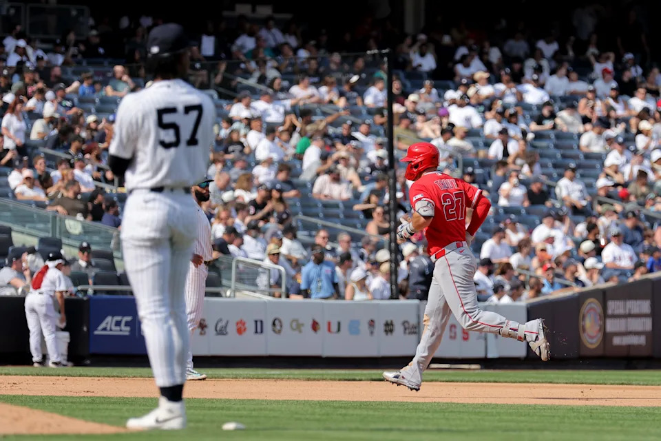 Apr 16, 2026; Bronx, New York, USA; Los Angeles Angels designated hitter Mike Trout (27) rounds the bases after hitting a solo home run against New York Yankees relief pitcher Angel Chivilli (57) during the seventh inning at Yankee Stadium. Mandatory Credit: Brad Penner-Imagn Images