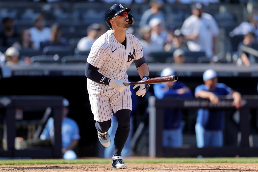 Yankees left fielder Randal Grichuk (34) watches his RBI sacrifice fly against the Kansas City Royals during the eighth inning at Yankee Stadium. Brad Penner-Imagn Images