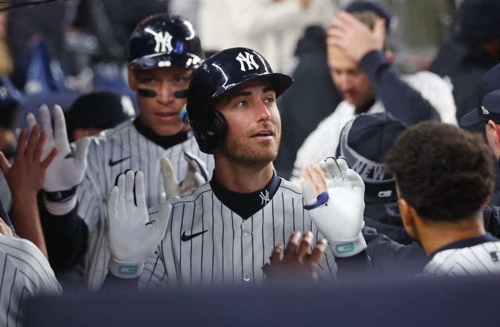 Yankees left fielder Cody Bellinger (35) is greeted by his teammates in the dugout after he scores on his two-run homer during the 5th inning when the New York Yankees played the Miami Marlins Saturday, April 4, 2026. Robert Sabo for NY Post