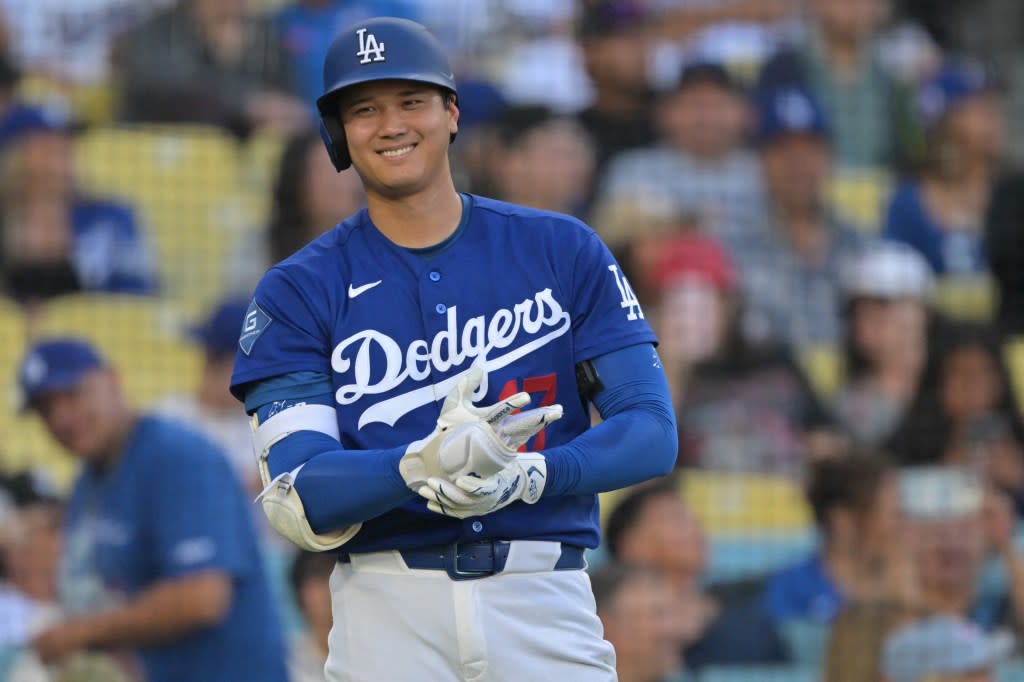 Los Angeles Dodgers two-way player Shohei Ohtani on deck in the fourth against the Los Angeles Angels at Dodger Stadium. Mandatory Credit: Jayne Kamin-Oncea-Imagn Images IMAGN IMAGES via Reuters Connect