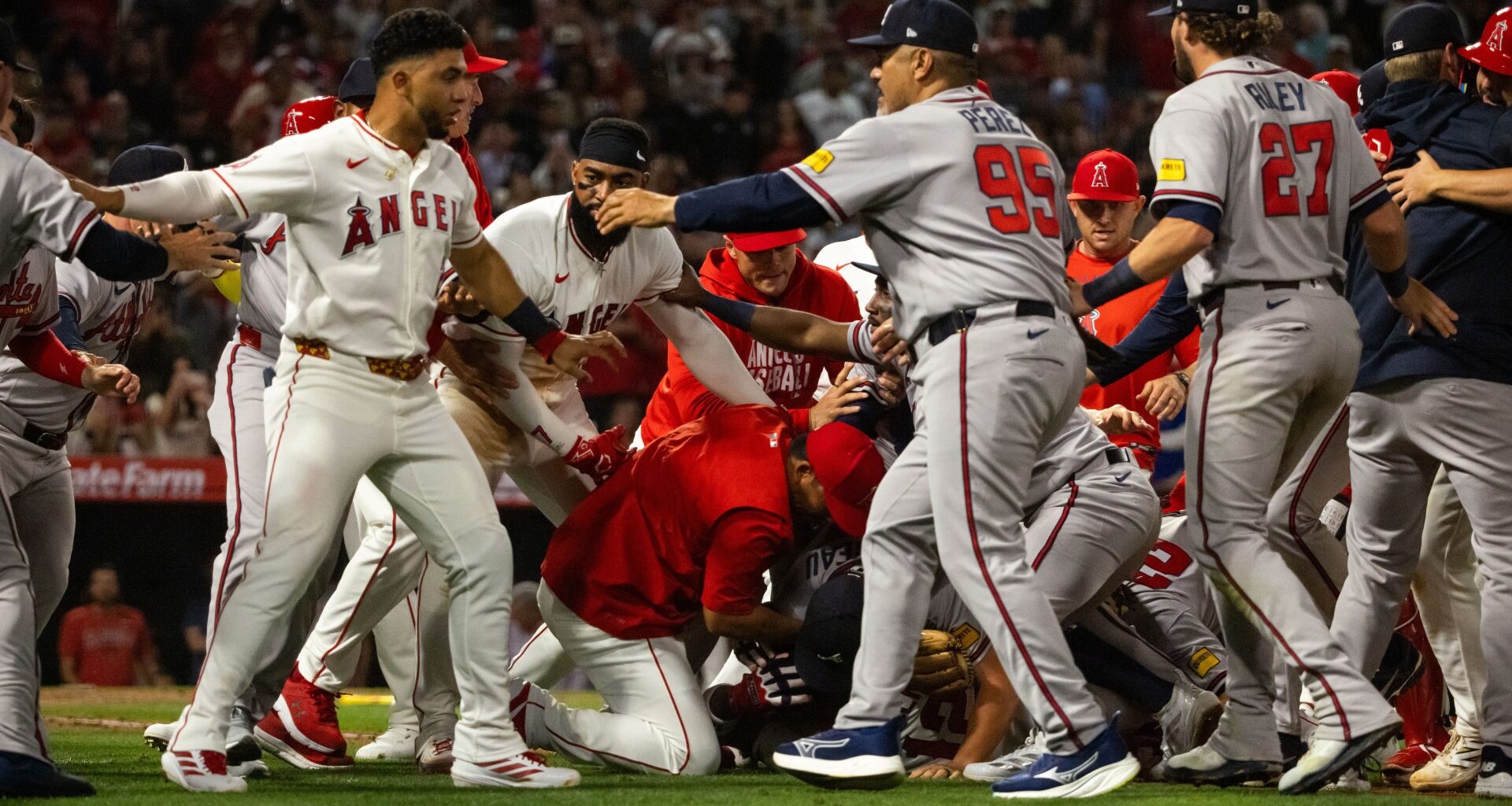 Shocking moment huge bench-clearing brawl breaks out between LA Angels and Atlanta Braves with punches thrown