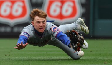 Winn's bloop single lifts Cardinals to 2-1 victory over slumping Mets in 11 innings