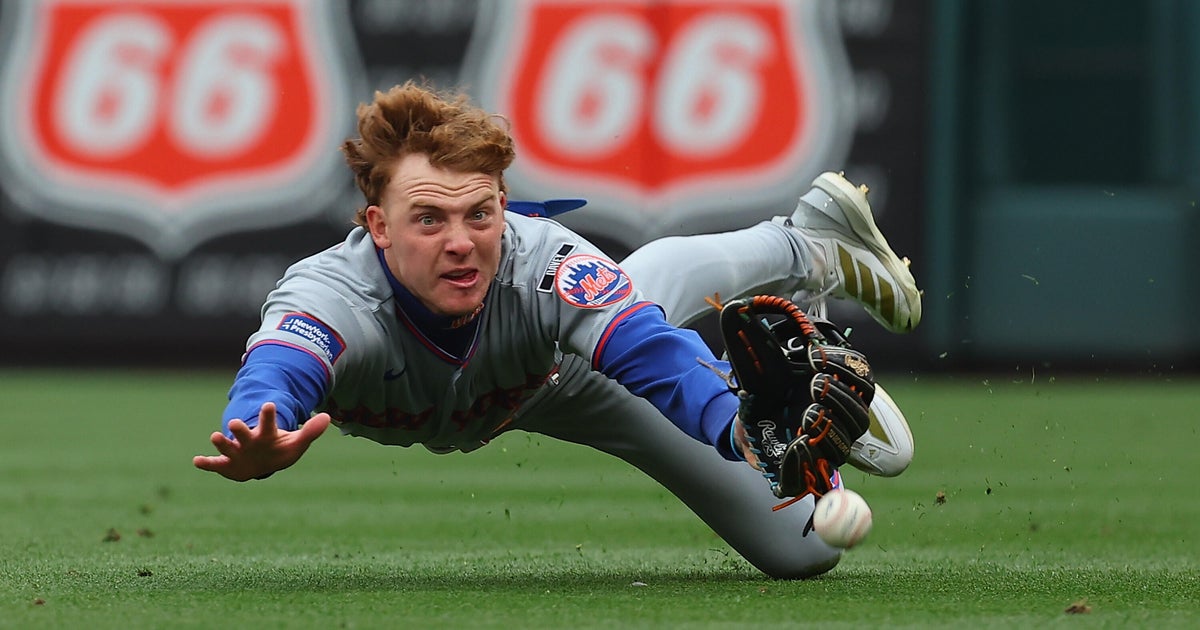 Winn's bloop single lifts Cardinals to 2-1 victory over slumping Mets in 11 innings