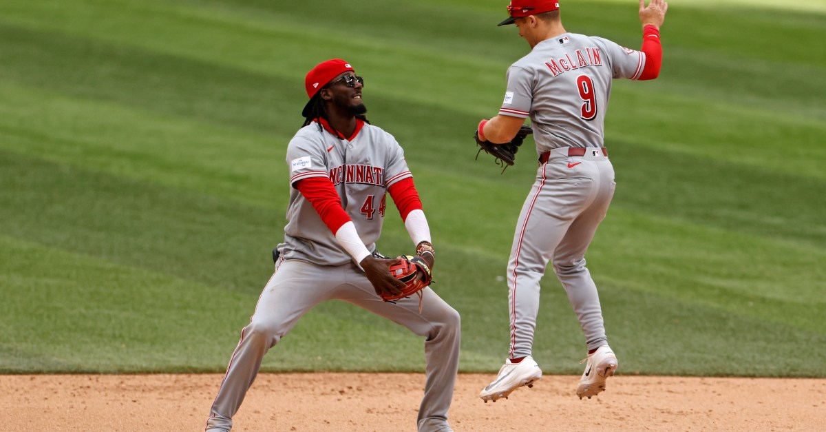 Reds storm back with late rally to beat Marlins in extra innings