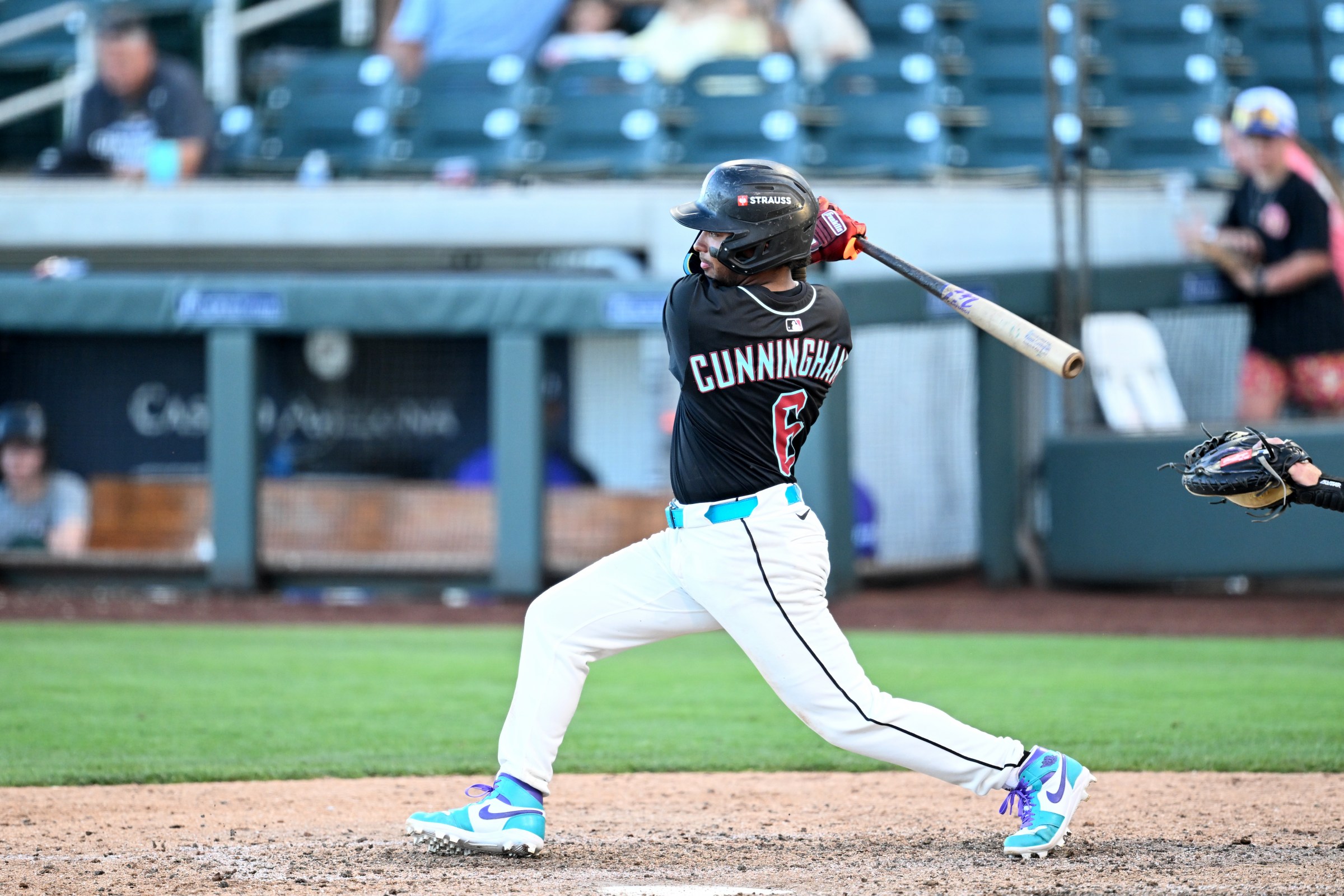 SCOTTSDALE, ARIZONA - MARCH 21: Kayson Cunningham #6 of the Arizona Diamondbacks hits a single during the sixth inning of a spring training Spring Breakout game against the Colorado Rockies at Salt River Fields at Talking Stick on March 21, 2026 in Scottsdale, Arizona. (Photo by Chris Bernacchi/Diamond Images via Getty Images)