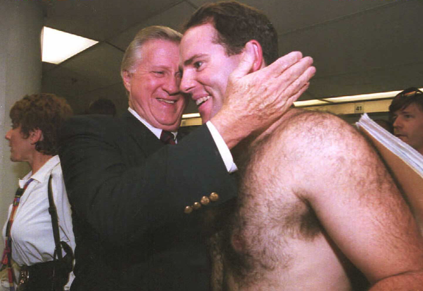 TORONTO, CANADA - OCTOBER 2: New York Yankees owner George Steinbrenner (L) hugs pitcher Scott Kamieniecki after the Yankees clinched the American League wild card berth as they defeated the Toronto Blue Jays 6-1 at Skydome 01 October. Kaminiecki pitched a complete game victory 30 September helping the Yankees to their first playoff appearance since 1981. AFP PHOTO (Photo credit should read GREIG REEKIE/AFP via Getty Images)