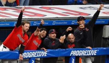 The Cleveland Guardians celebrate in the dugout after a three-RBI triple by Chase DeLauter, not pictured, in the eighth inning of a baseball game against the Houston Astros in Cleveland, Tuesday, April 21, 2026. (AP Photo/David Richard)