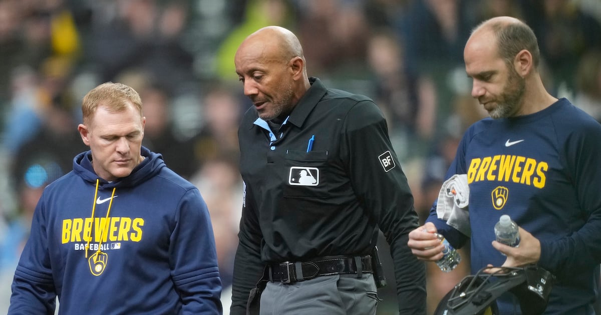 Umpire C.B. Bucknor leaves Rays-Brewers game after foul tip hits him in face mask - WSB-TV Channel 2