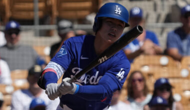 Mar 21, 2026; Phoenix, Arizona, USA; Los Angeles Dodgers second baseman Hyeseong Kim (6) hits against the Athletics in the first inning at Camelback Ranch-Glendale. Mandatory Credit: Rick Scuteri-Imagn Images