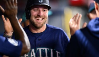 Mariners score three runs, two broken bats, beat Angels in extras