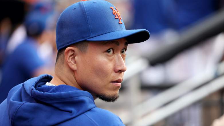 The New York Mets' Kodai Senga watches from the dugout.