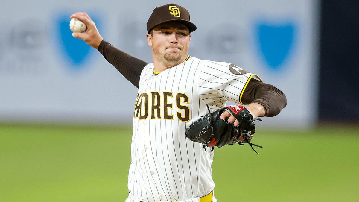 San Diego Padres relief pitcher Mason Miller throwing a pitch at Petco Park.