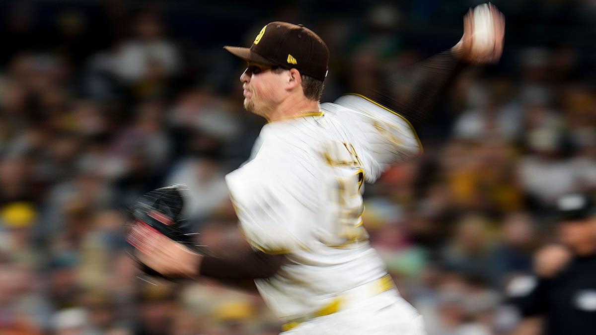 San Diego Padres pitcher Mason Miller pitching against Colorado Rockies batter