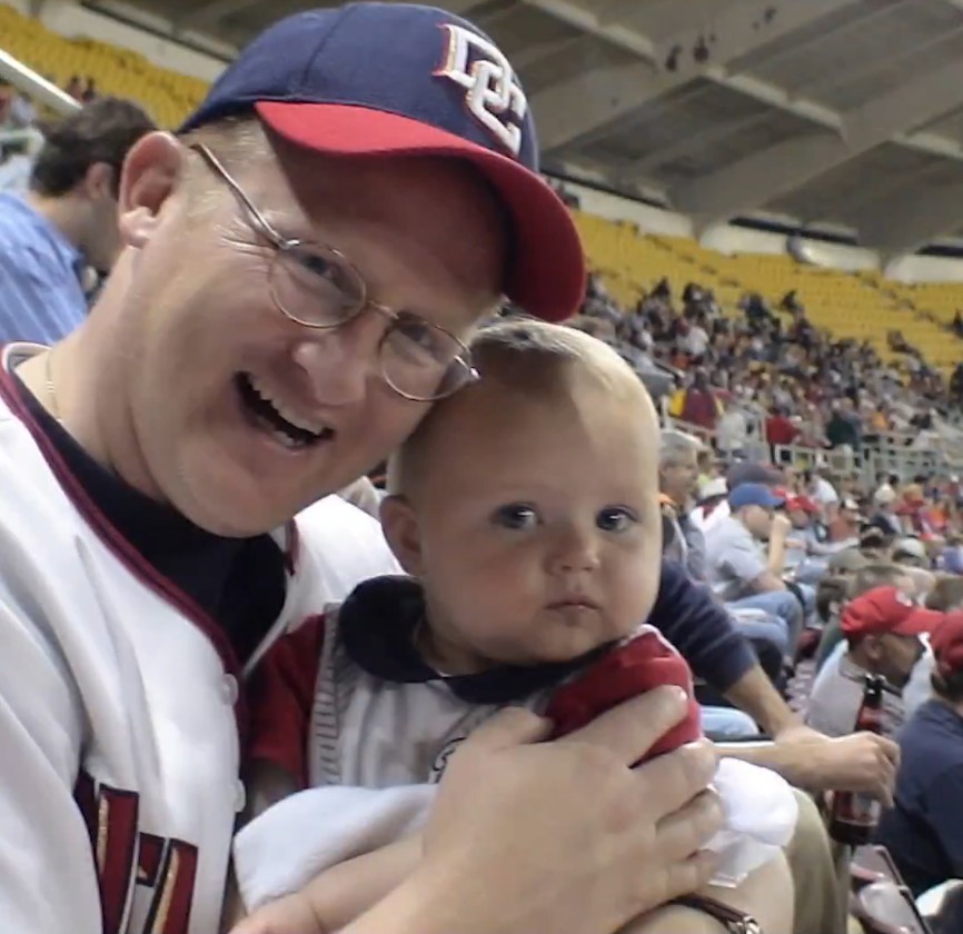 Sorcha Lewis as a young fan at a Nationals game.