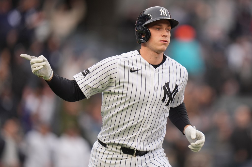 Ben Rice reacting after hitting a three-run homer.