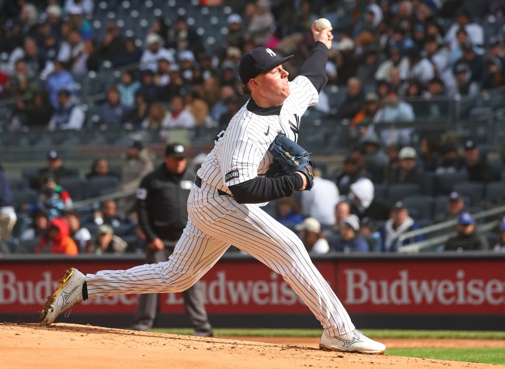 New York Yankees pitcher Ryan Weathers pitches in the first inning.