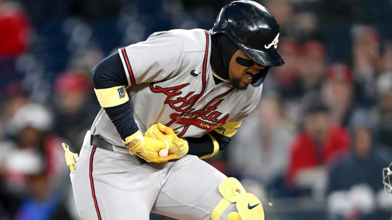 Ronald Acuña Jr. of the Atlanta Braves reacts during a game after being hit by a pitch against the Washington Nationals