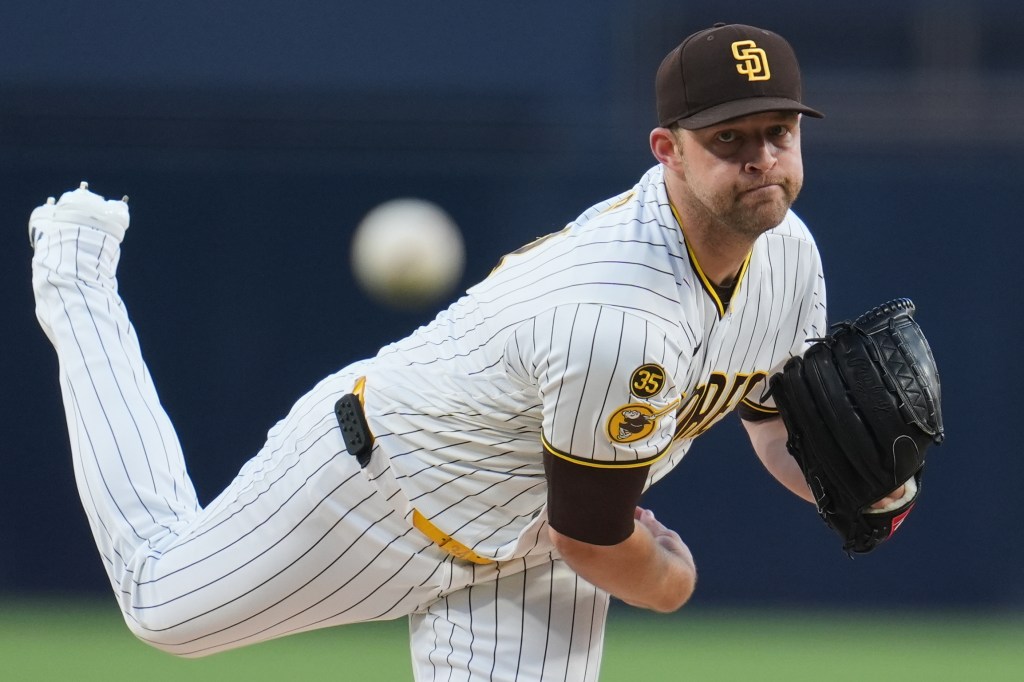 San Diego Padres pitcher Michael King mid-throw.