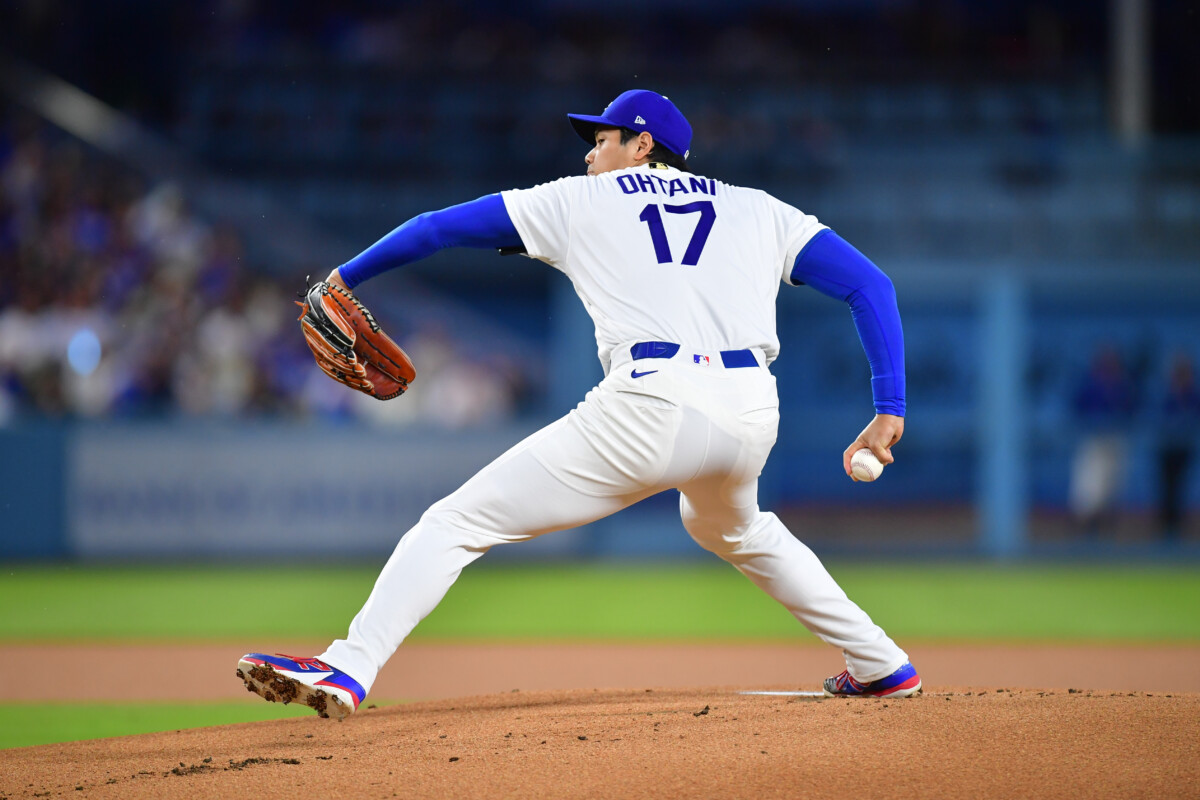 Mar 31, 2026; Los Angeles, California, USA; Los Angeles Dodgers two-way player Shohei Ohtani (17) throws to the plate during the first inning against the Cleveland Guardians at Dodger Stadium. Mandatory Credit: Gary A. Vasquez-Imagn Images