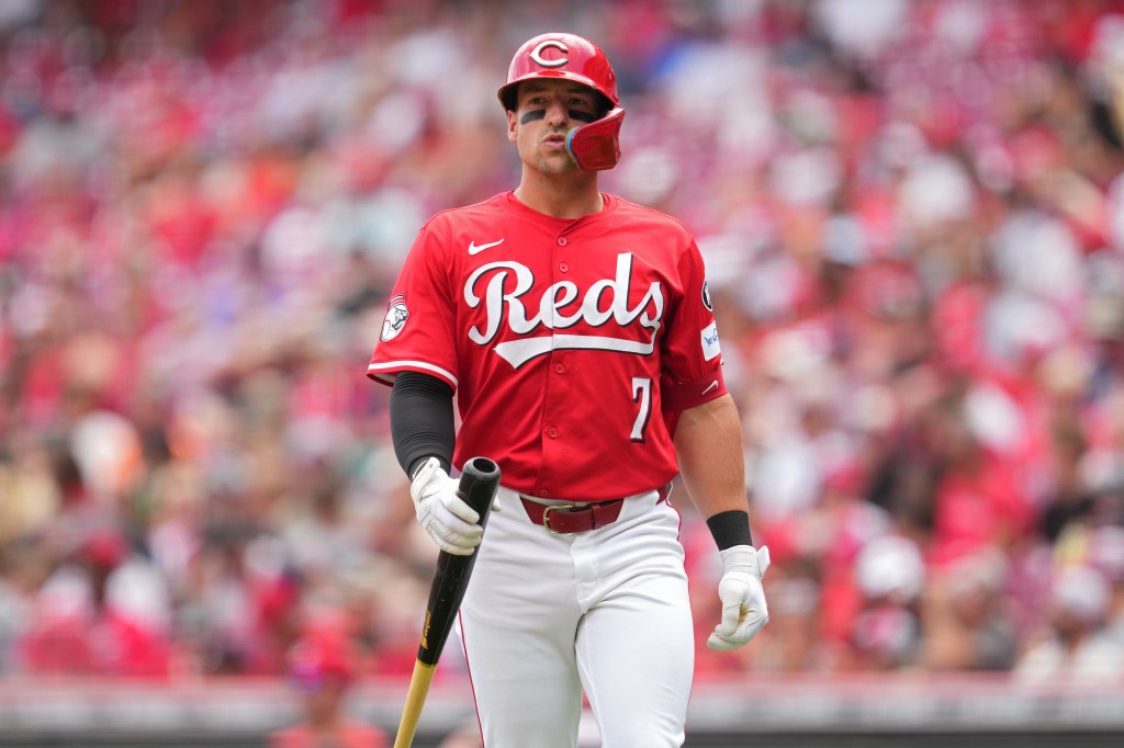 Spencer Steer #7 of the Cincinnati Reds looks on during a game.