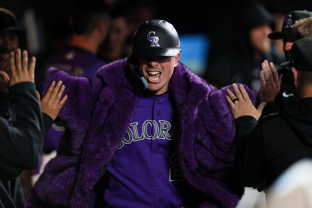 Colorado Rockies' wear purple faux fur coat for home run celebrations