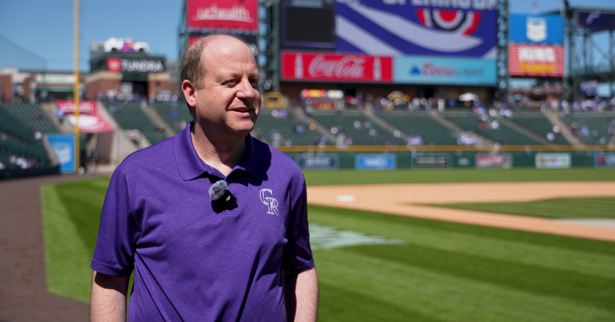 Colorado Gov. Jared Polis attends Rockies home opener