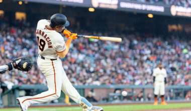 Apr 6, 2026; San Francisco, California, USA; San Francisco Giants right fielder Jerar Encarnacion (19) grounds to get on base during the second inning against the Philadelphia Phillies at Oracle Park. Mandatory Credit: Bob Kupbens-Imagn Images