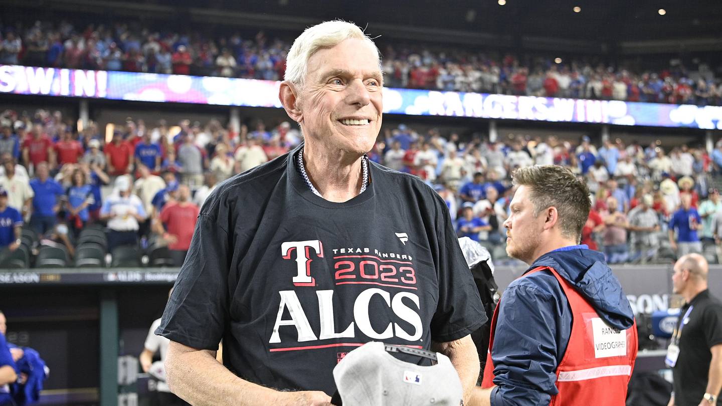 Oct 10, 2023; Arlington, Texas, USA; Texas Rangers owner Ray C. Davis smiles on field after the win against the Baltimore Orioles in game three of the ALDS for the 2023 MLB playoffs at Globe Life Field. Mandatory Credit: Jerome Miron-Imagn Images