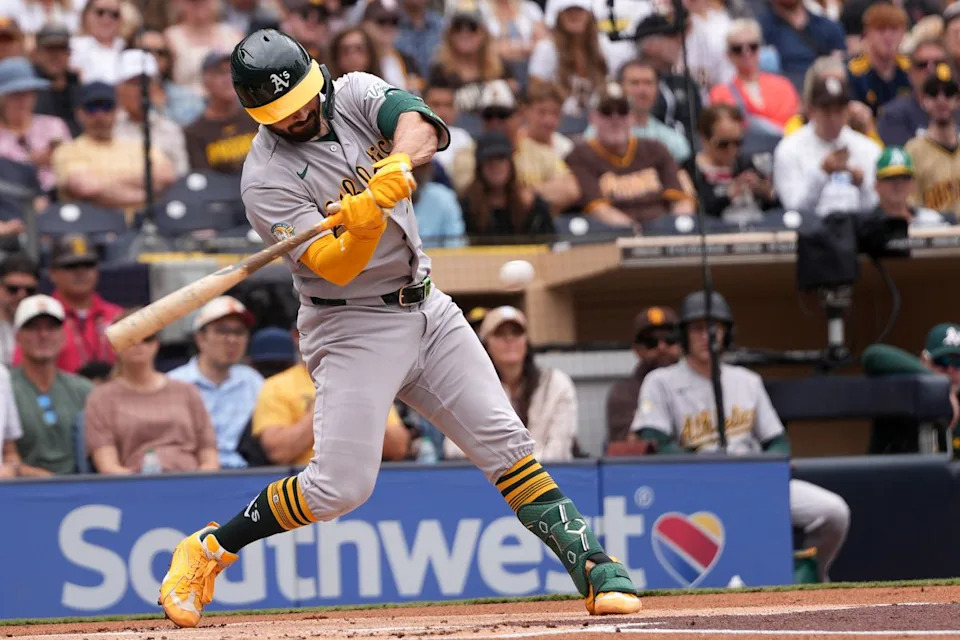 Athletics catcher Shea Langeliers (23) hits the ball during an MLB baseball game against the Padres, Sunday May 24, 2026 in San Diego, California.