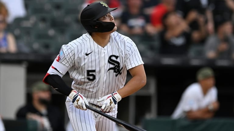 Chicago White Sox's Munetaka Murakami watches his solo home run...