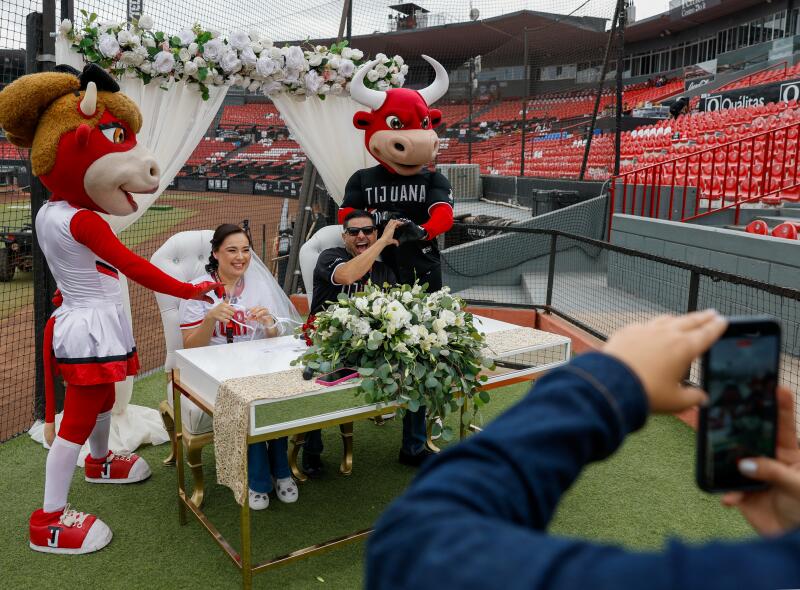 Newlywed couple Jessica Oneda Rojas and Moises Benitez celebrate.