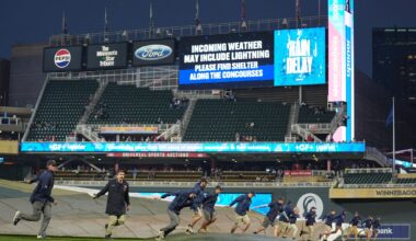 Josh Bell homers twice as Twins beat Astros 6-3 in game delayed nearly 2 hours by rain