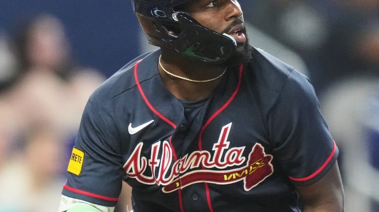 Atlanta Braves' Michael Harris II watches after hitting a solo...
