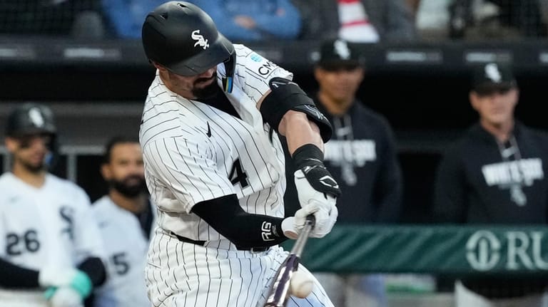 Chicago White Sox's Randal Grichuk hits a one-run single during...