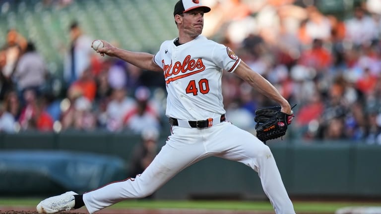 Baltimore Orioles starting pitcher Chris Bassitt delivers during the third...