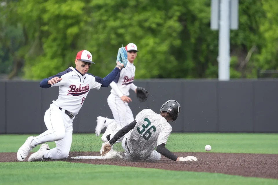 Byram Hills second baseman Logan Verma makes a play as Pleasantville baserunner Paul Buccheri slides at the Section 1 Class A baseball championship at North Rockland High School in Thiells on May 30, 2026.