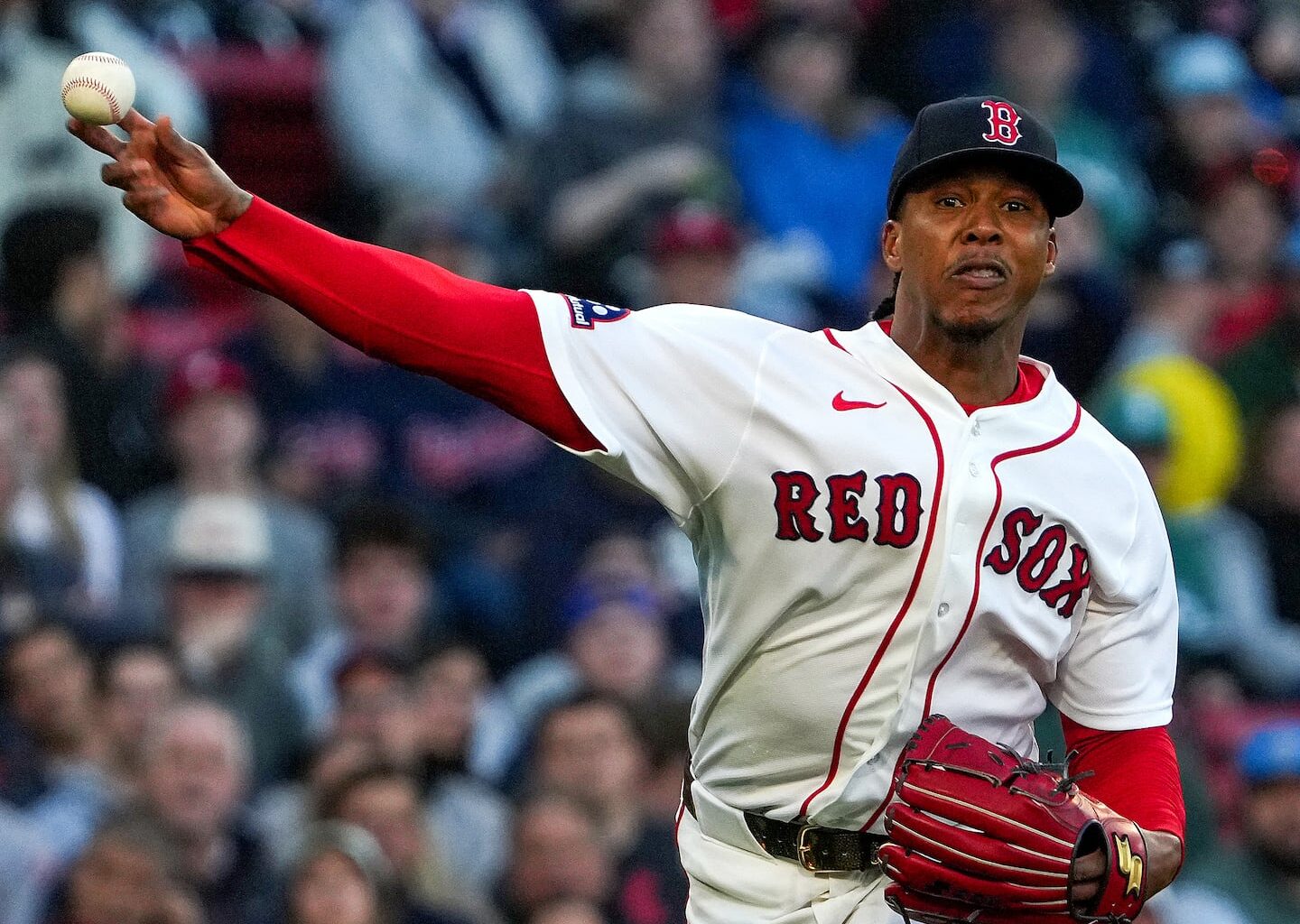 Red Sox pitcher Brayan Bello fires to first base for the out after fielding a grounder in the second inning.